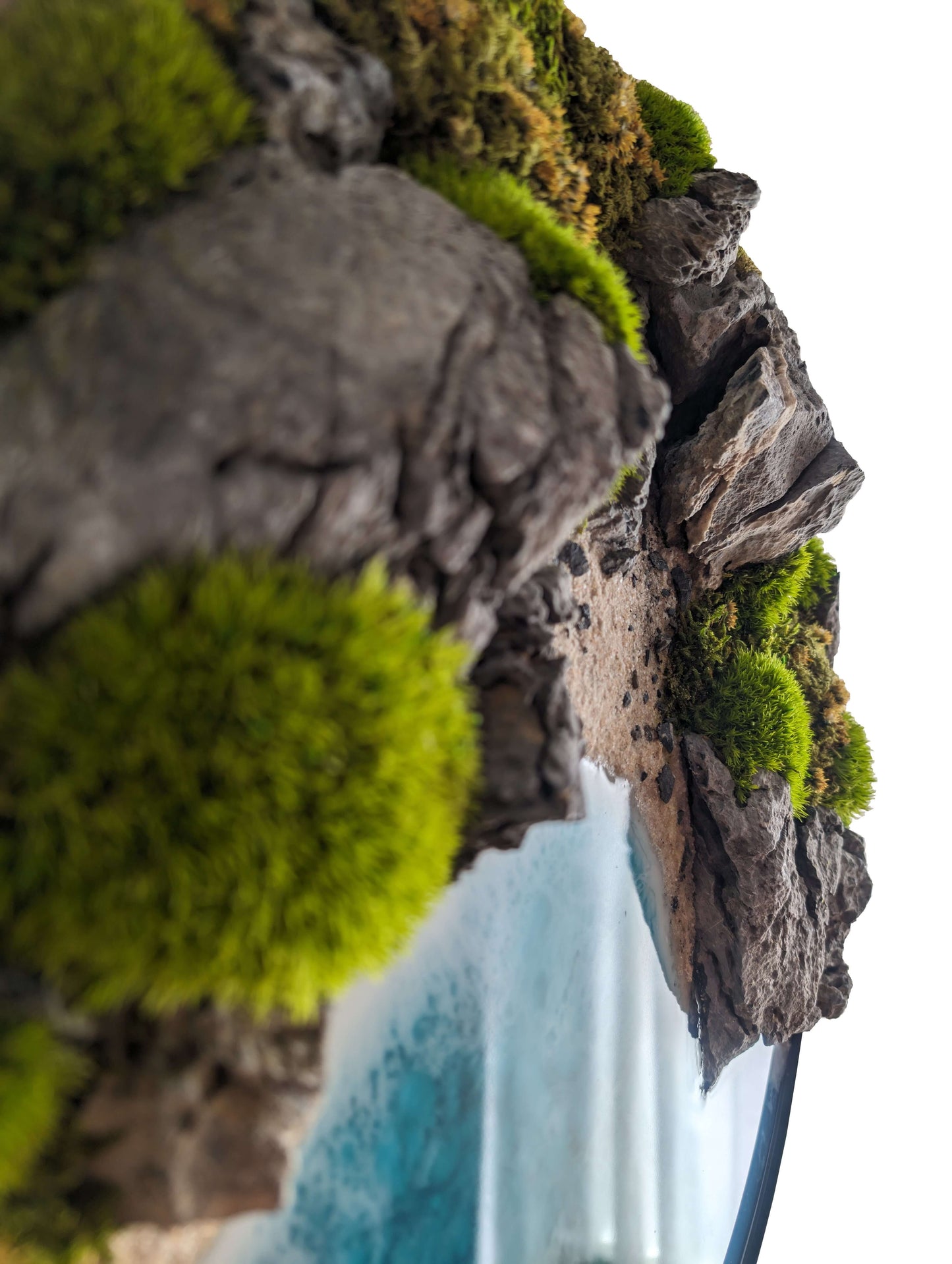 Detail of 'Autumn Coast' wall art featuring moss and rocky textures in a unique epoxy resin composition.