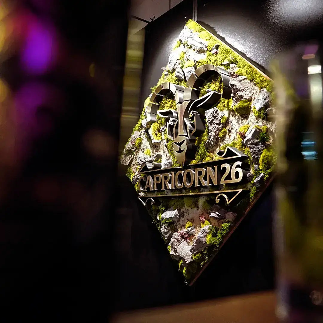 Moosbild mit Firmenlogo als 3D-Druck & Metallverblendung - exklusives Design von Capricorn 26